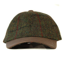 Load image into Gallery viewer, Green Harris Tweed and leather baseball cap by Carlisle Hats, showing a stylish cap with a curved brim and textured fabric.