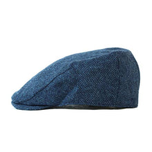 Load image into Gallery viewer, Carlisle Hats Ivy Cap made of Shetland wool tweed featuring a classic, textured pattern and a rounded brim for a timeless look.