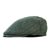 Load image into Gallery viewer, Carlisle Hats Ivy Cap made of Shetland wool tweed featuring a classic, textured design and a rounded brim for a timeless look.