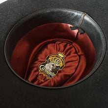 Load image into Gallery viewer, Black Camden Westbury Cowboy Hat by Carlisle Hats, 55cm, featuring a classic cowboy style with a wide brim and decorative band.