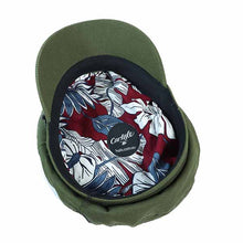 Load image into Gallery viewer, Small green Carlisle Hats fisherman cap with a classic skipper style, featuring a rounded crown and short brim.