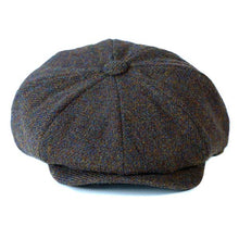Load image into Gallery viewer, Grey and black Harris Tweed newsboy cap by Carlisle Hats, featuring a classic herringbone pattern and small 56cm size.