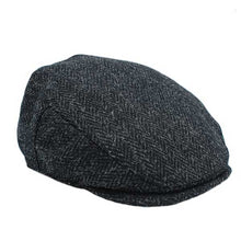Load image into Gallery viewer, Carlisle Hats Highland Harris Tweed flat cap showing classic textured plaid fabric and rounded brim, stylish men's headwear.