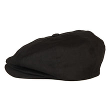 Load image into Gallery viewer, Black cotton drill newsboy cap by Carlisle Hats shown on head, featuring classic rounded crown and short brim.