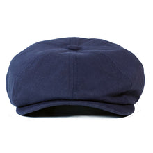 Load image into Gallery viewer, Blue cotton drill newsboy cap by Carlisle Hats, featuring a classic rounded crown and short brim for vintage style.