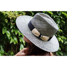 Load image into Gallery viewer, Black and natural wide brim Camden Panama straw hat by Carlisle Hats, featuring a stylish, breathable design.