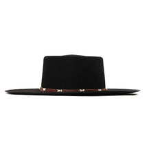 Load image into Gallery viewer, Black leather Spanish riding hat by Carlisle Hats with silver accents, 55cm size, traditional equestrian headgear.