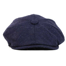 Load image into Gallery viewer, Black Carlisle Hats newsboy cap made of Shetland wool and twill fabric, shown in medium size (58cm).