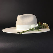 Load image into Gallery viewer, Carlisle Hats Camden Fedora in stone white featuring a classic fedora style with a wide brim and stylish band.