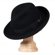 Load image into Gallery viewer, Black Carlisle Hats Elwood Fedora with a wide brim and classic fedora style, shown on a clean background.