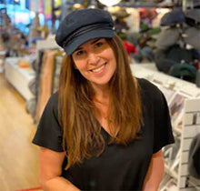Load image into Gallery viewer, Small green Carlisle Hats fisherman cap with a classic skipper style, featuring a rounded crown and short brim.