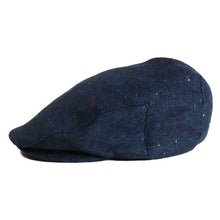 Load image into Gallery viewer, Blue wool blend Ivy cap with fleck pattern by Carlisle Hats, featuring a classic flat cap style and textured fabric.