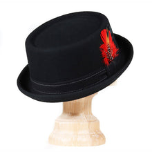 Load image into Gallery viewer, Black and orange Carlisle Hats pork pie hat in assorted colors, featuring a classic round shape and a stylish brim.